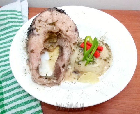 coconut milk poached fish with parsley